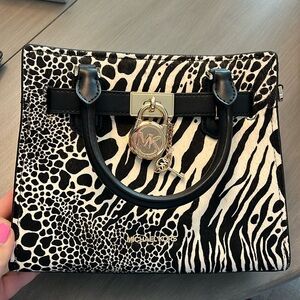 New with tags! Michael Kors leather Hamilton satchel. Handles/strap